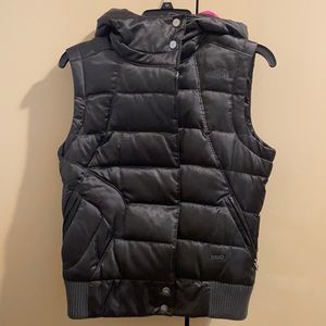 North Face black and pink hooded puffed vest.